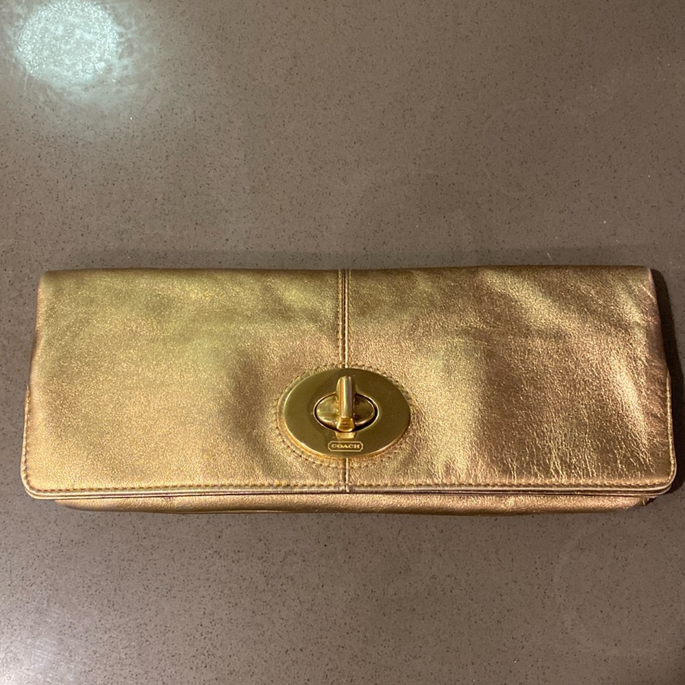Coach gold clutch. Great condition